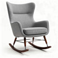 Poltrona a dondolo in tessuto grigio con struttura in legno e metallo 85 x 70 x 100cm